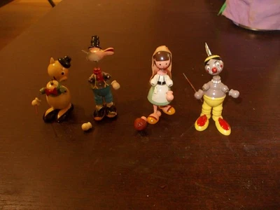 Lot 4 figurines bois avec ressort à restaurer (années 50/60) - Photo 1/4