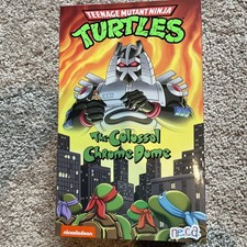 NECA Teenage Mutant Ninja Turtles  The Colossal Chrome Dome Action Figure