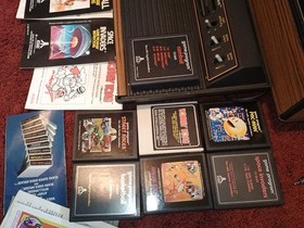 Atari 2600 W Games Paddles Joy Sticks And Game Center  For Parts