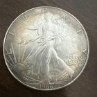 U.S. American Eagle 1986 Silver 1 oz Coin Design. First year. Nice Rustic Toner.