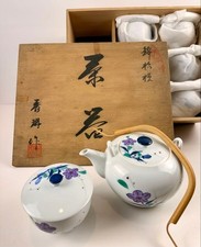Japanese tea set with teapot, lid, teacups, wooden box, used