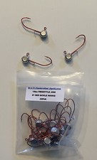 25 Hand made 1/8oz w/ keeper freestyle jig heads with a #1 red sickle hooks