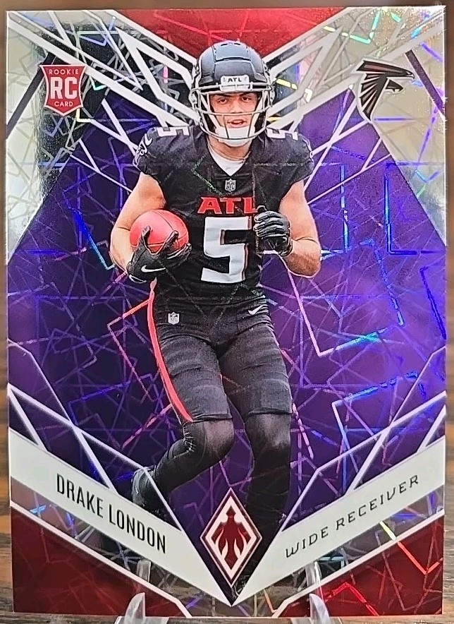 2022 Panini Phoenix Rookies Purple Lazer /99 Drake London #107 Rookie RC