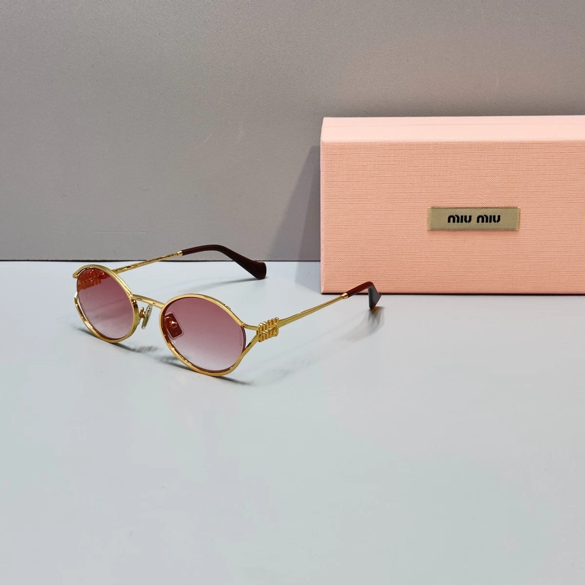 Miu Miu Round Gold Frame Pink Gradient Lens Sunglasses Miu Miu 0MU 54YS Sunglasses ZVN20F Gold - eye-oo.com main image 4
