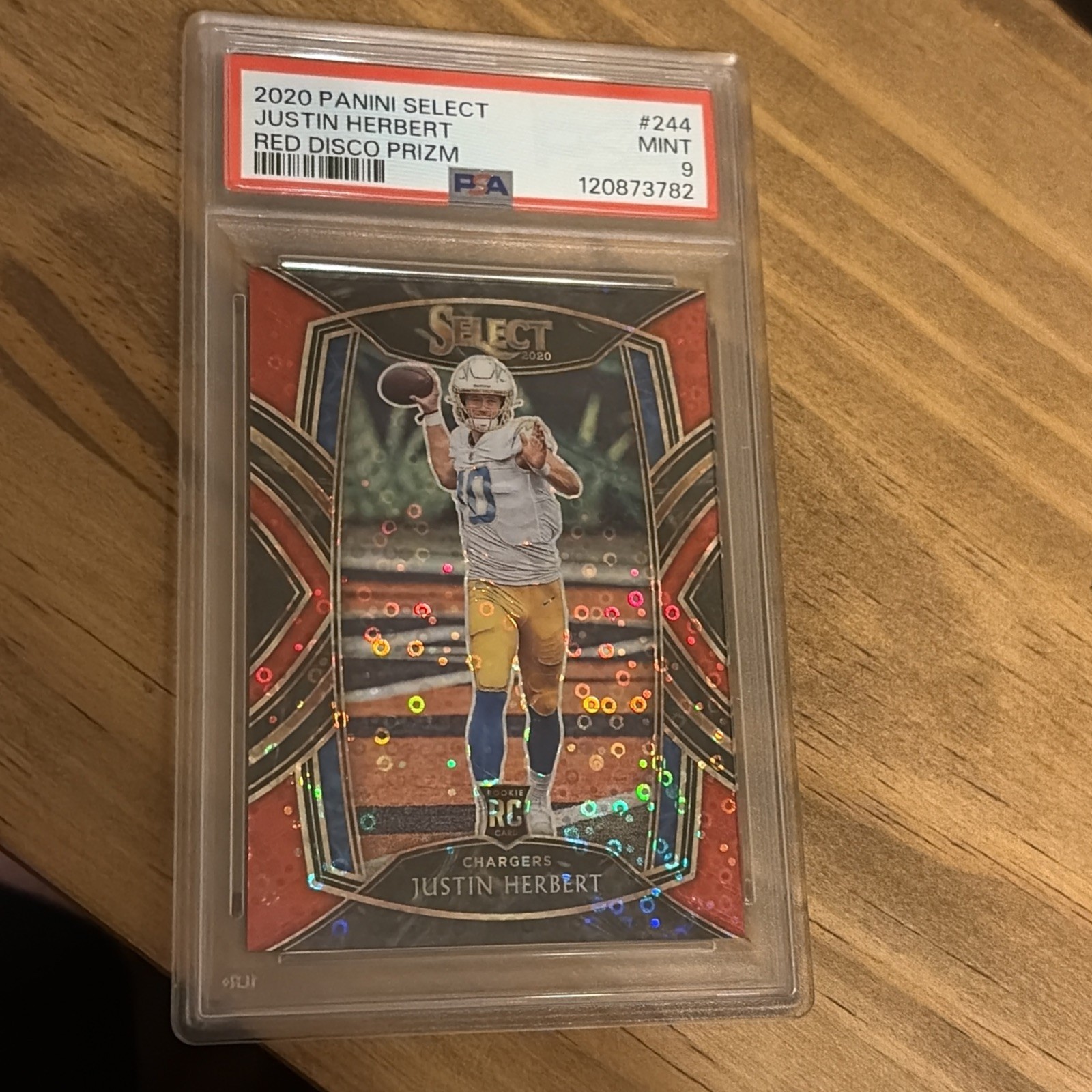 2020 Panini Select - Club Level Justin Herbert #244 Red Disco Prizm /49 (RC)