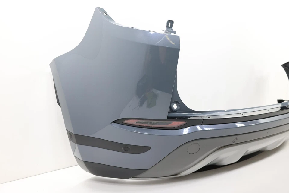 LAND ROVER EVOQUE 2021-2023 PARACHOQUES TRASERO CUBIERTA PANEL MONTAJE OEM GRIS_1CT Foto 2 de 4
