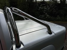 VW Amarok Roll-N-Lock Retractable Tonneau Cover + Sports Roll Bar