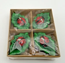 New in Box Floating Candles Lady Bug On Holly Leaf 4 Pack Wrapped