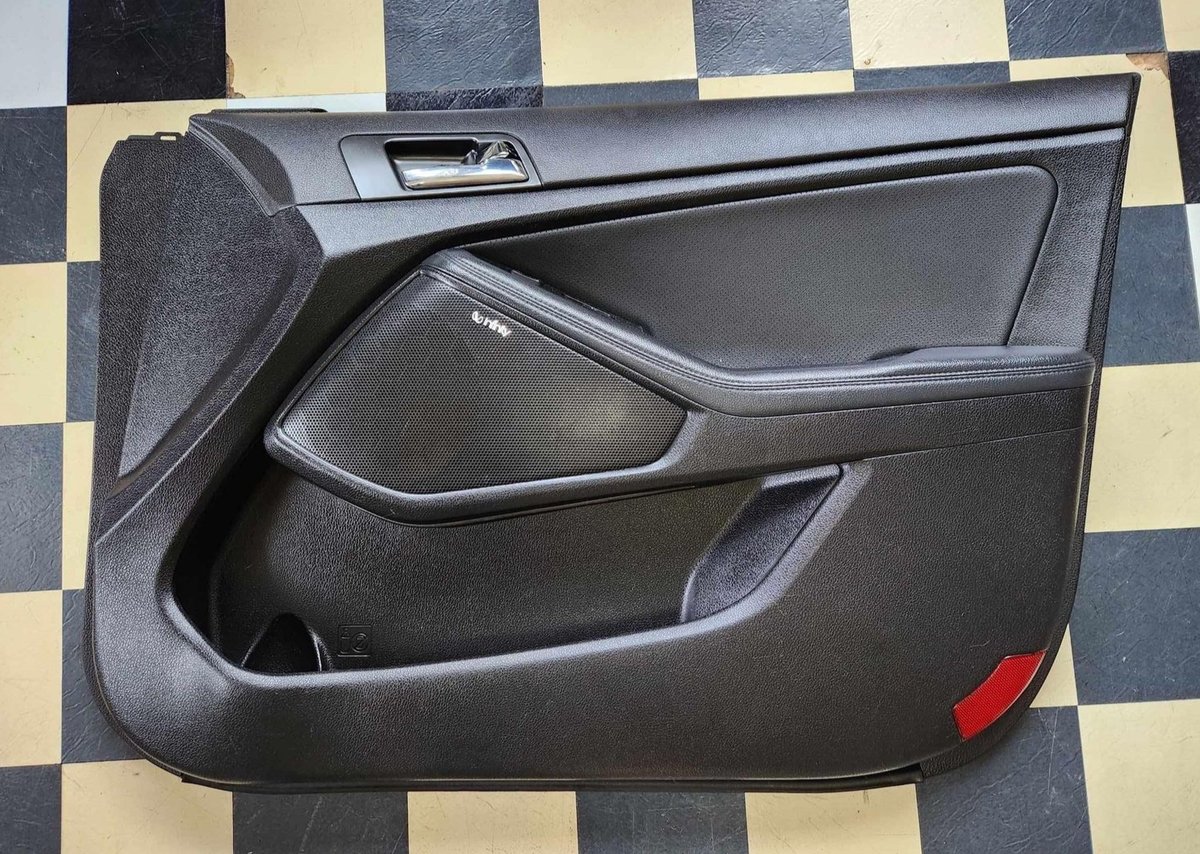 2013 Kia Optima SX front PASSENGER side interior door panel; black