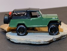 GREENLIGHT COLLECTABLES ALL-TERRAIN - 1968 JEEPSTER COMMANDO -  1/64 Series 11