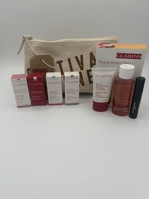 Clarins 7 PCs travel set including prep & perfect trio +Clarins Makeup Bag Nib