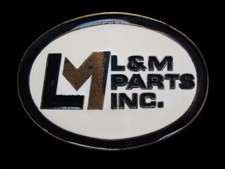 NG07101 VINTAGE 1970s  L M PARTS INC.  COMPANY BRASSTONE BELT BUCKLE