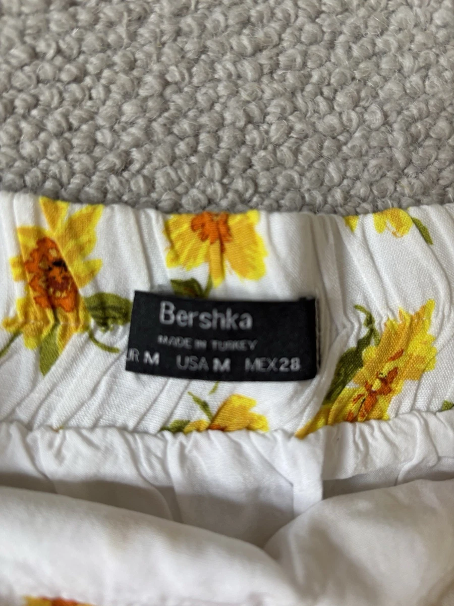 Minifalda Bershka para mujer nueva sin etiquetas blanca y amarilla con volantes florales talla M