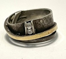 sterling silver 925 ring, plated with 14 karat gold.