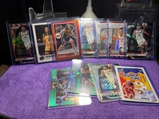 (11) 2024 Panini Prizm WNBA Kelsey Mitchell #64 Ice Prizm + Donruss /299 + +