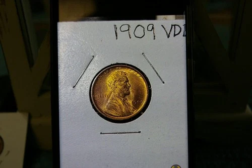 1909 VDB uncirculated wheat cent with some beautiful toning : very nice coin :