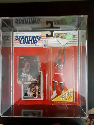 1993 MICHAEL JORDAN STARTING LINEUP SLU WITH 2 TOPPS CARDS NEW SEALED WITH CASE.