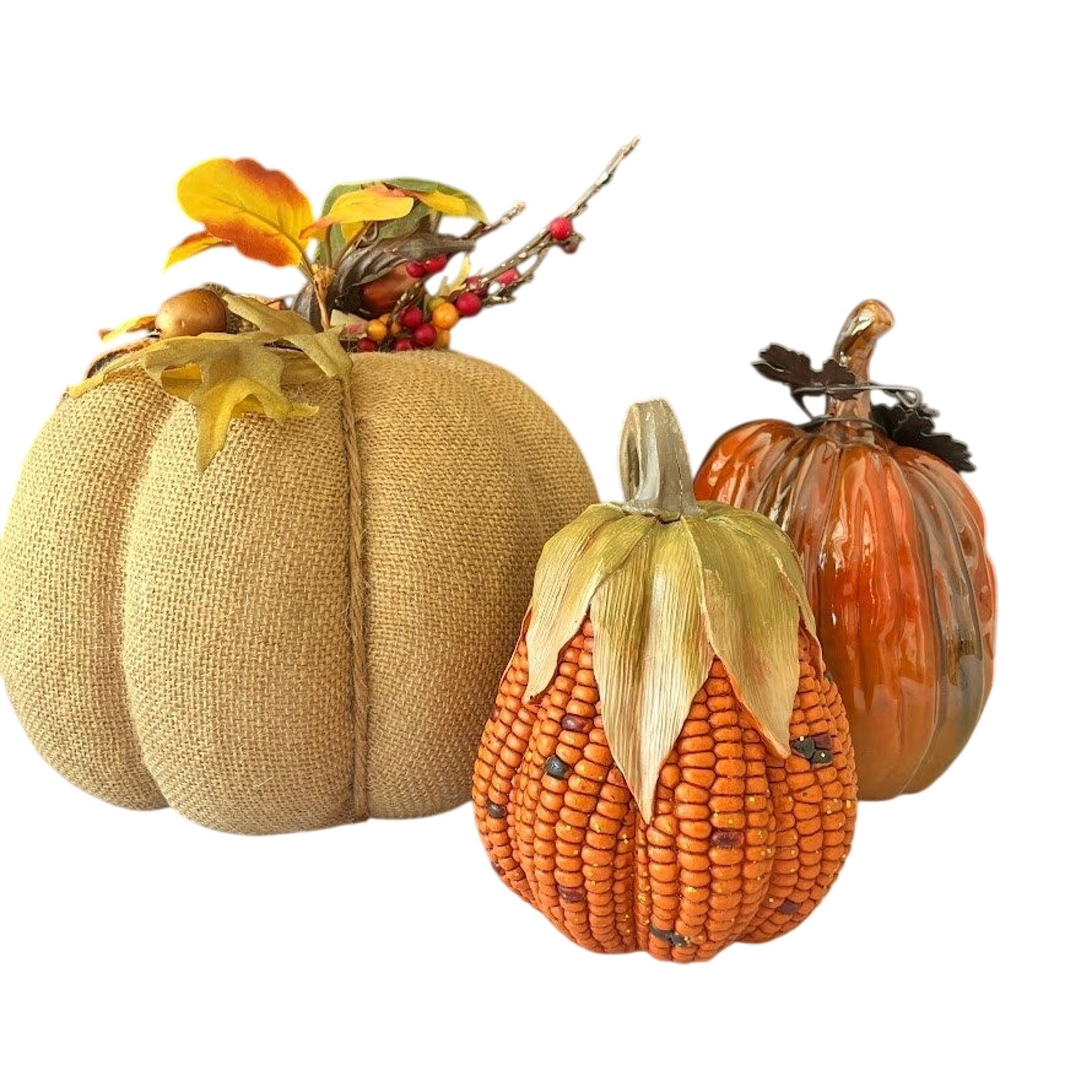 Burlap, corn, and resin pumpkin decor set in autumn tones.