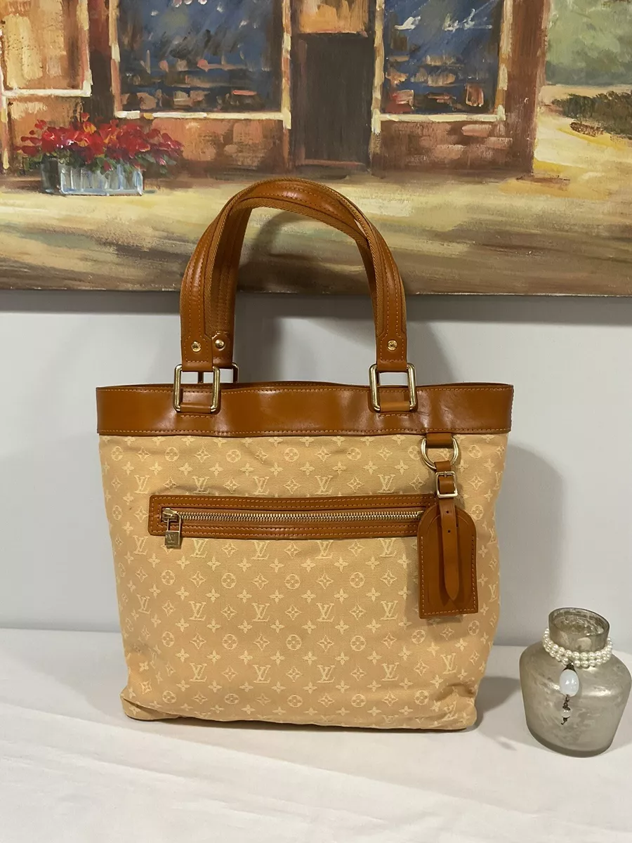 tan louis vuitton purse