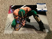 KALISTO Signed Autograph 8x10 Photo WWE COOL WITH BELT LUCHA BAS BECKETT