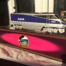 MTH F59PH AMTRAK  DIESEL  O SCALE LOCOMOTIVE.