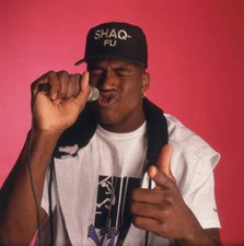 Shaquille O'Neal raps in a studio.1980's Basketball photo 11