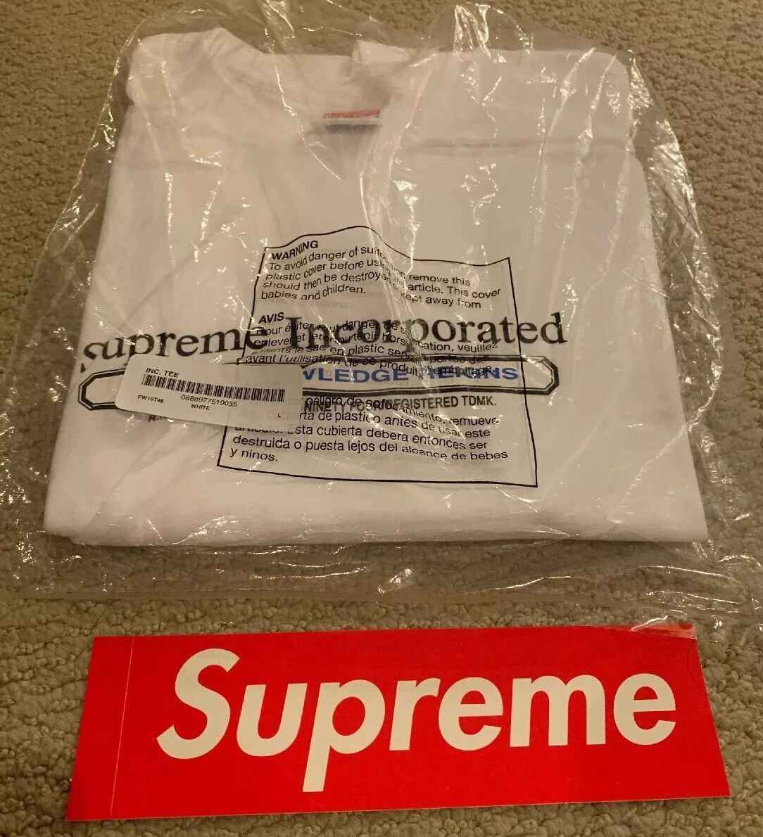 Tee shirt Supreme Inc. blanc pâle FW19T46 taille L grand sac neuf jamais ouvert