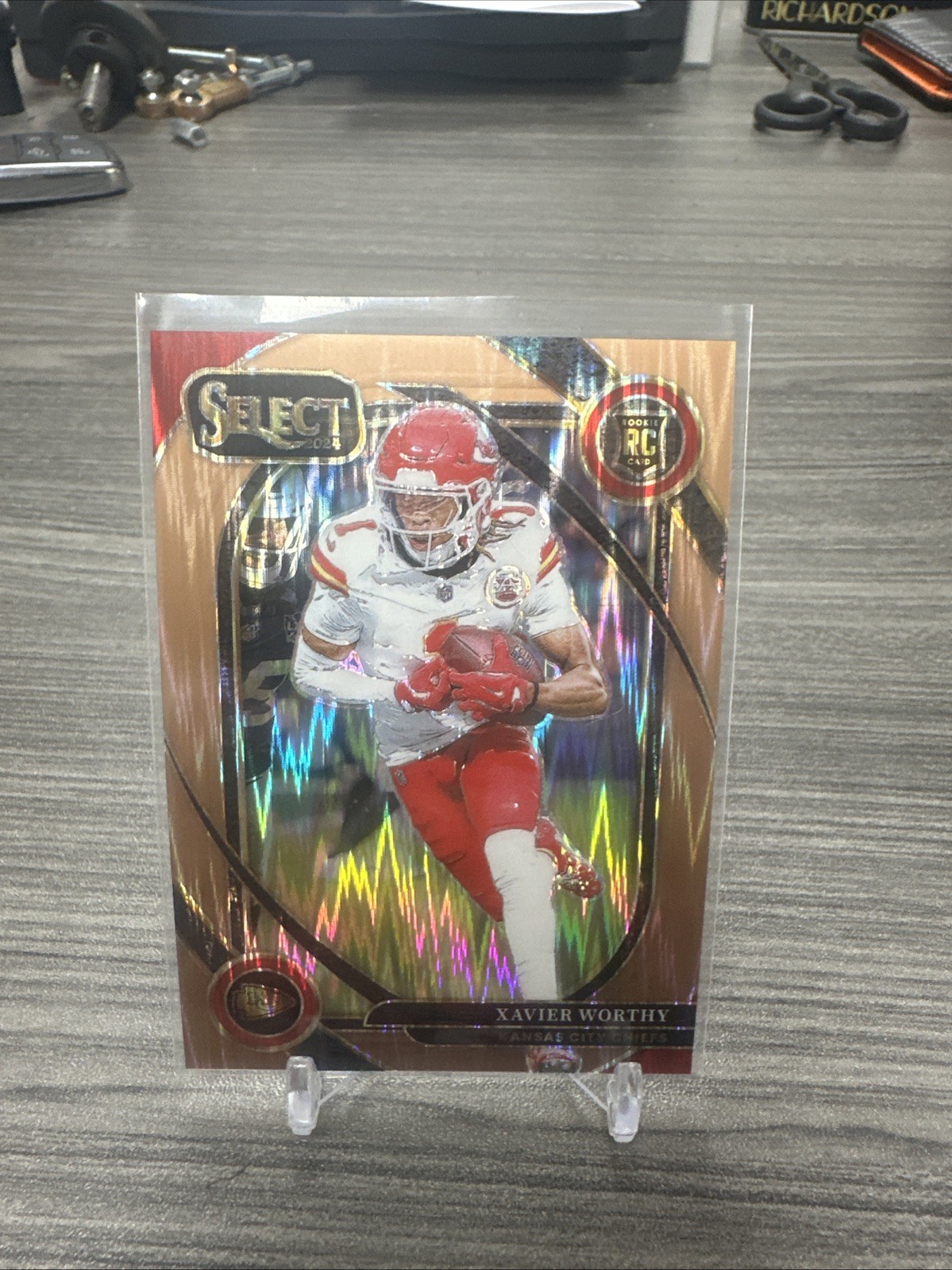 2024 Panini Select - Club Level Xavier Worthy #224 Copper Shock Prizm /299 (RC)