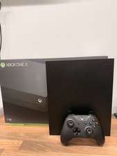 Xbox One x Black 1TB 4K Gaming Console with One Official Controller And A Game