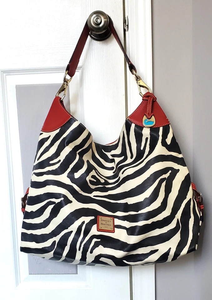 Dooney & Bourke Saffiano leather shoulder bag(hobo style) in zebra print- NWOT