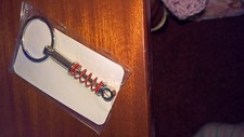 SHOCK ABSORBER  METAL KEYRING 