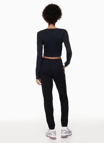 Pantalones deportivos Aritzia TNA de algodón negro tejido gofre, talla M - Imagen 12 de 12