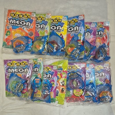 Gogos crazy bones Mega Metropolis Magazines 23-34 figures and pods SEALED NEW