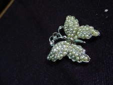 Silver tone butterfly pendant with little pave faux pearls