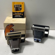 Zestaw 2 różnych aparatów błyskawicznych Kodak - "Uchwyt" i "Pleaser II"