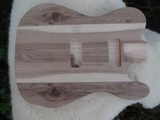 tele style guitar body in native ash and walnut routed for p90