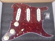 Texas special style pickups in a tortoise shell pickguard for Stratocaster body