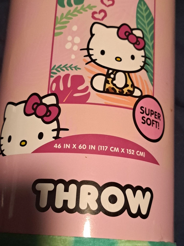 Manta polar Sanrio Hello Kitty tropical selva, 46" X 60" Foto 3 de 4