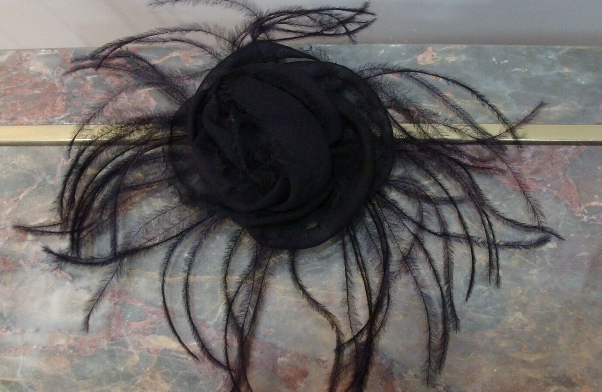 chanel feather brooch