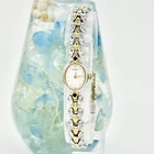 SEIKO 1E20 6160 Watch Oval Stone Gold Silver Blue Solar Timepiece Vintage