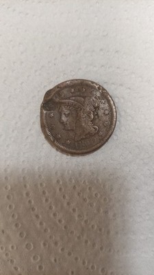 A large U.S. copper one-cent coin from 1853, known as the ''Braided Hair Large Ce