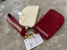 LULULEMON DUAL POUCH WRISTLET KEYCHAIN FORWOMEN ZIP .