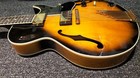 Golden Howard Roberts Fusion GIBSON electric guitar with black pickguard, silver hardware, and glossy brown sunburst finish.