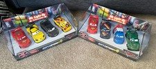 2 Disney Store Pixar Cars 2 Die Cast Gift Sets World Grand Prix NIB 4 Packs