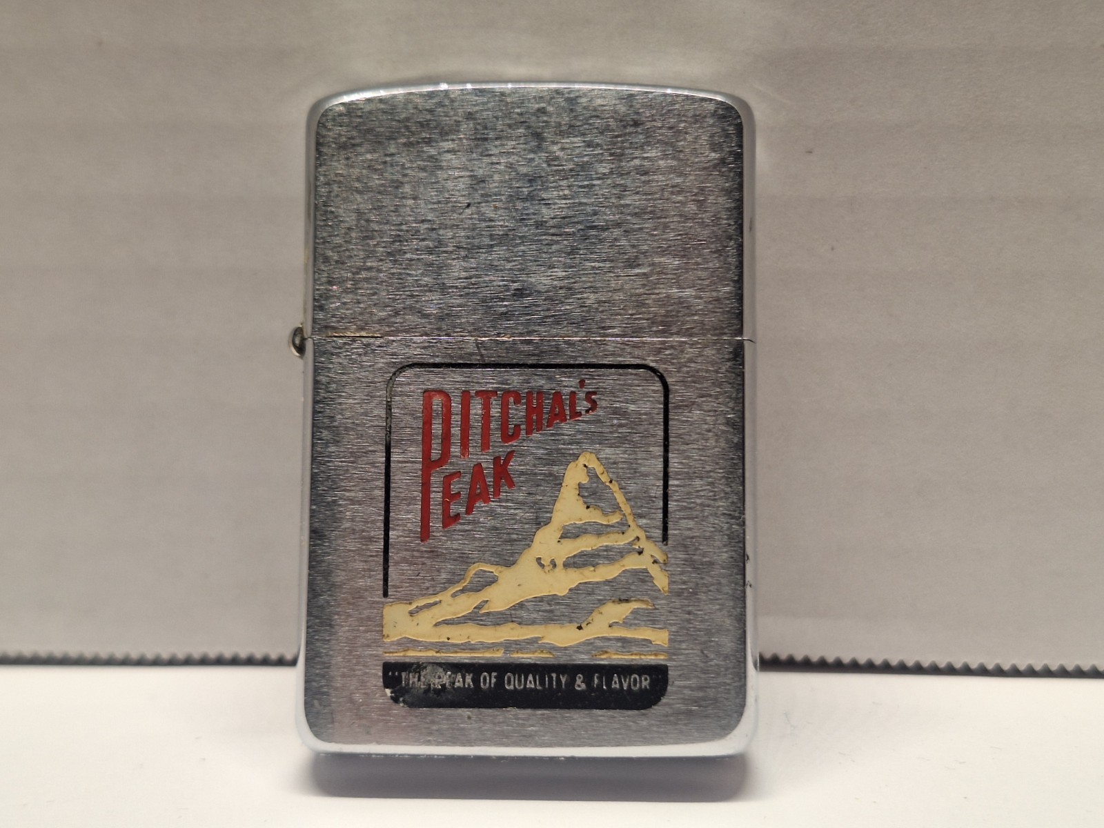 1960 ZIPPO PITCHAL'S PEAK "THE PEAK OF QUALITY AND FLAVOR" G