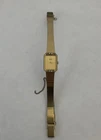 Vintage Seiko Quartz Watch 2E20-5099 Diamond Bezel All Gold Rectangular case