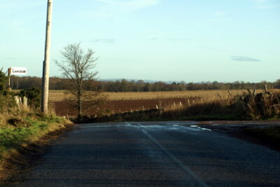 Photo 6x4 Signpost depicting Longbank Farm Muirhouses The signpost shows  c2009