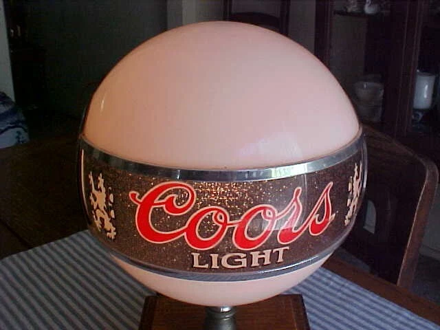 VINTAGE ADOLPH COORS GLOBE BAR TOP LIGHT WITH ROTATING ON TAP IN RED LETTERS