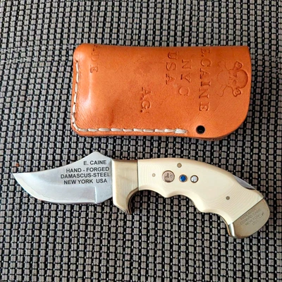 E. Caine Jagdmesser Damaststahl Drop-Point Ganz-Erl 5–8 cm mit Scheide - Bild 1 von 2