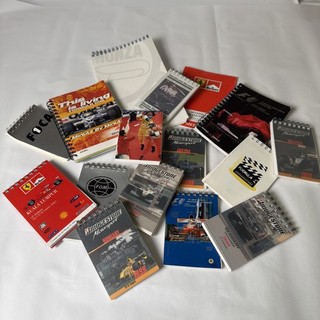 Formula One Grand Prix memorabilia. Vintage notebooks from F1 media centres